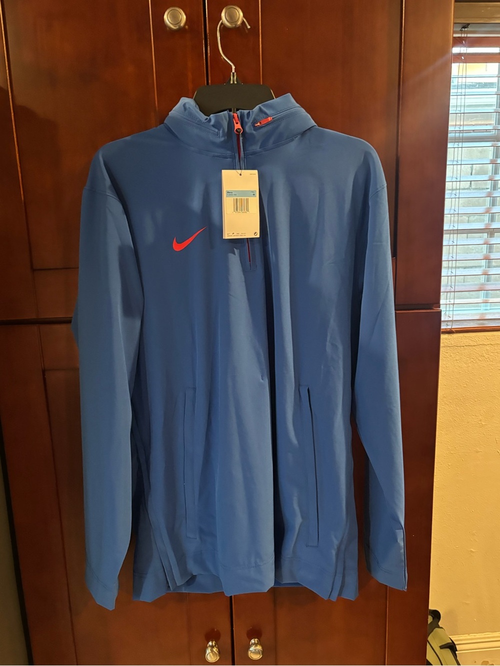 Nike Men’s Blue Windbreaker Jacket with Red Swoosh